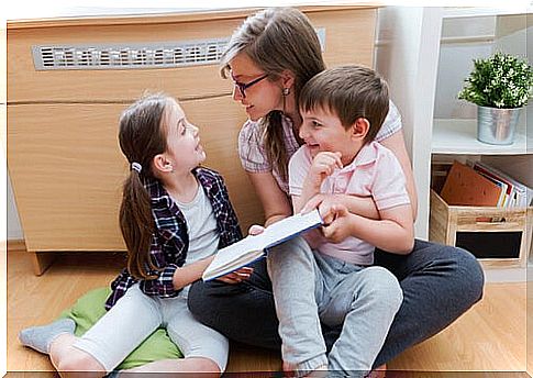 Mother telling stories to her children to stimulate language.