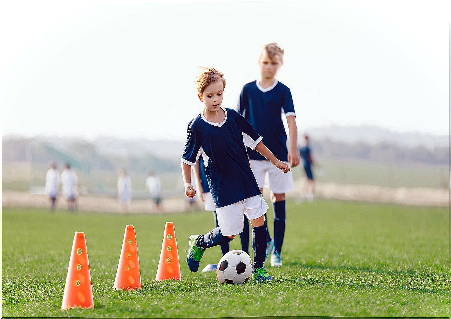 Boys in a soccer training to improve children's psychomotor skills.