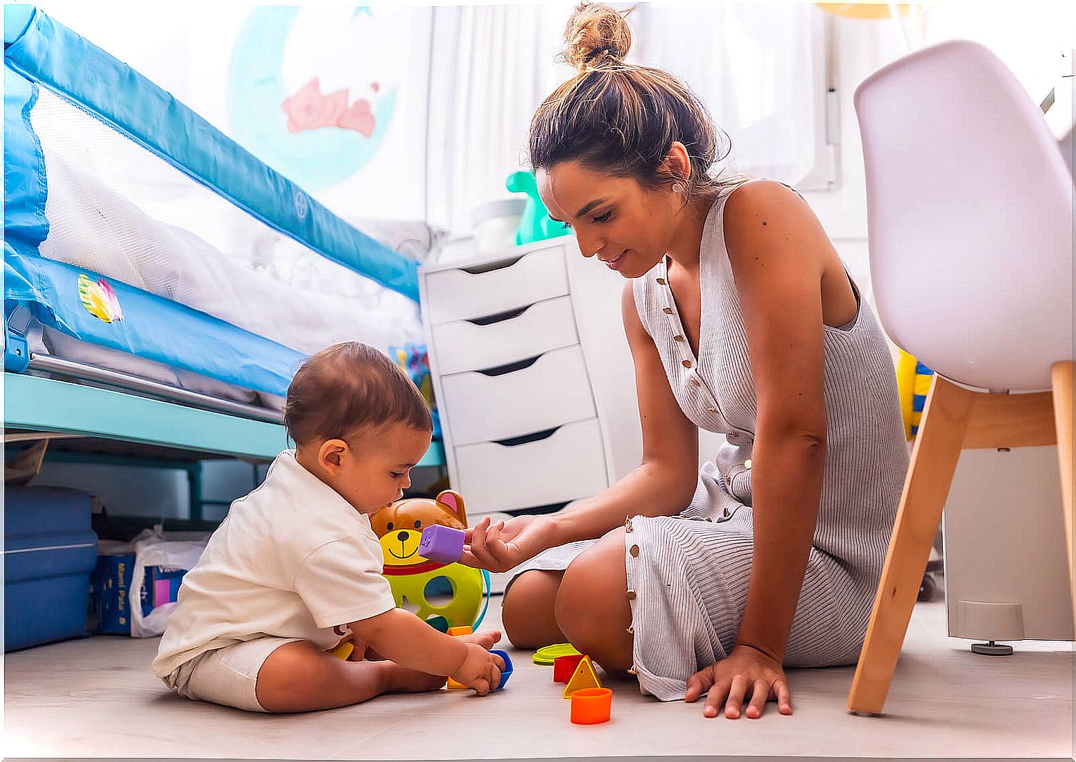 Mother playing with her baby and bringing out her inner child.