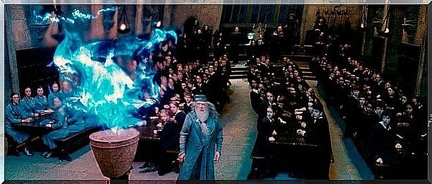 Dumbledore with the Goblet of Fire in Harry Potter.