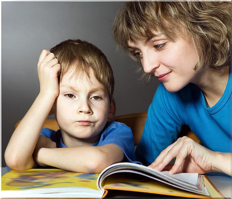 Mother reading with her son patiently because they do not know how to choose a good book for the little one to like.