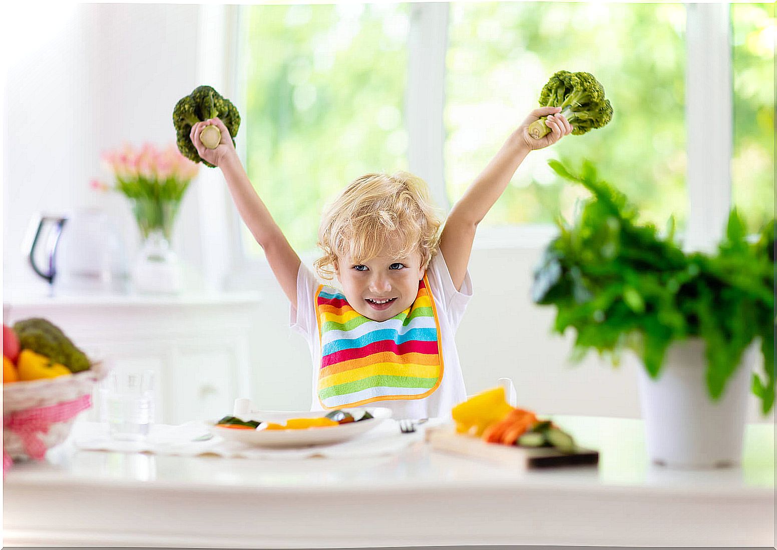 Happy child because he is going to eat fruits and vegetables.