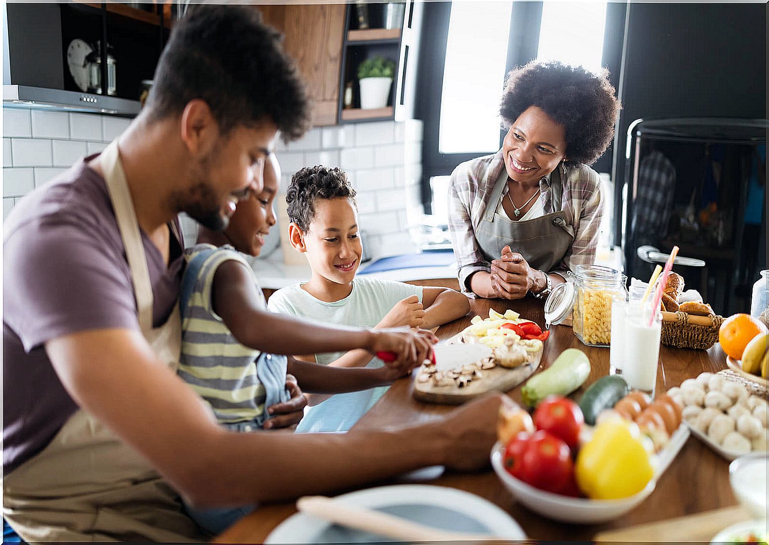 Family cooking and planning a healthy menu to increase the consumption of vegetables.