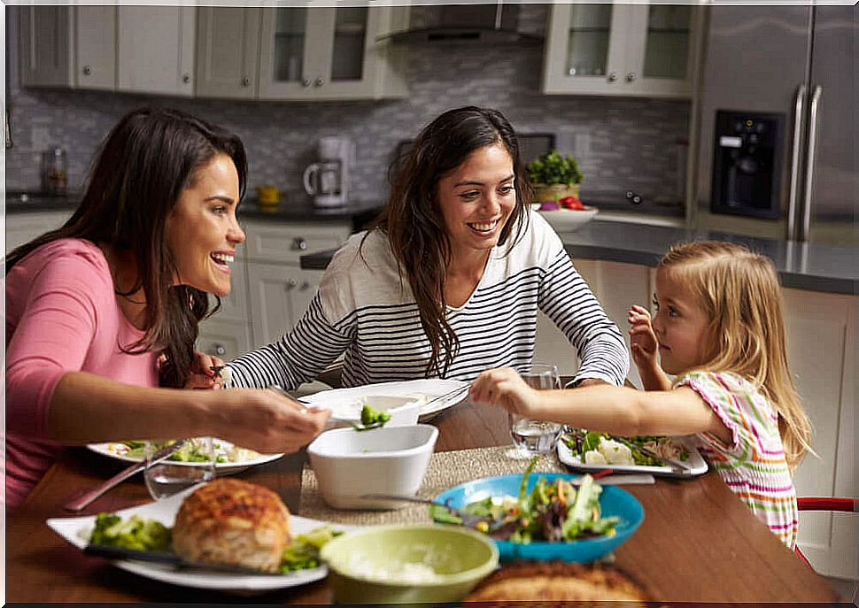 Family making healthy dinners according to the school menu.