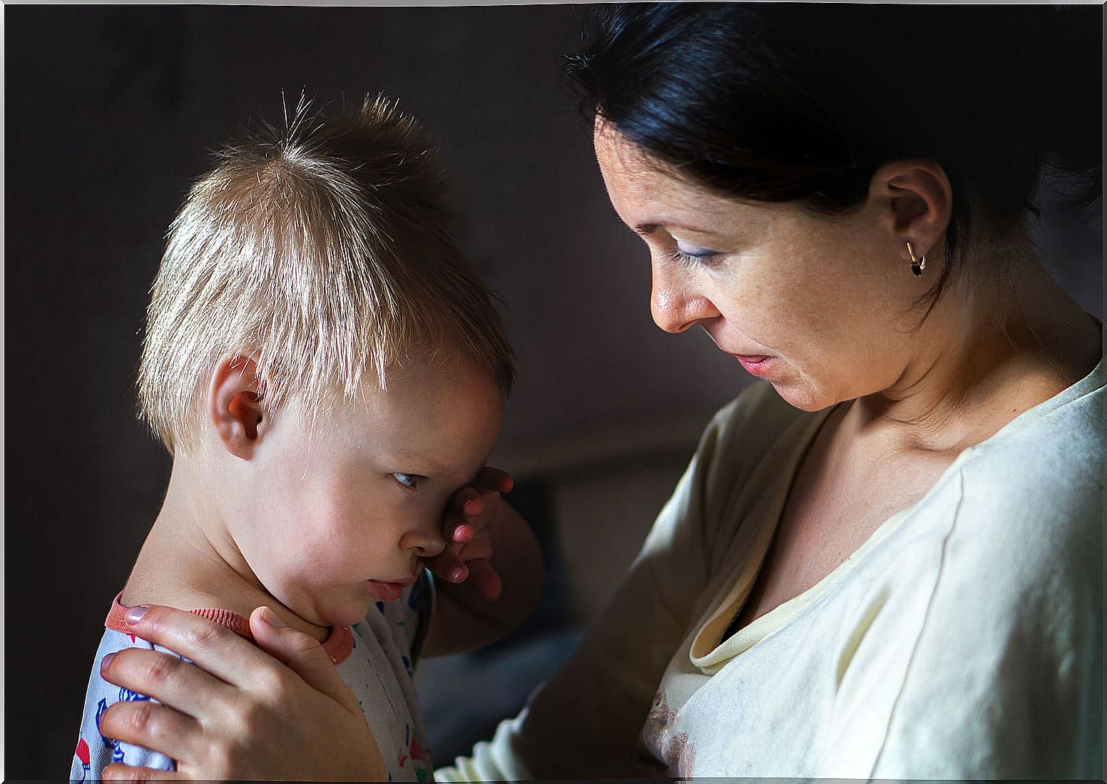 Mother talking to her angry son.