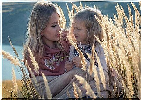 Mother talking with her daughter to show that older people should also respect children.