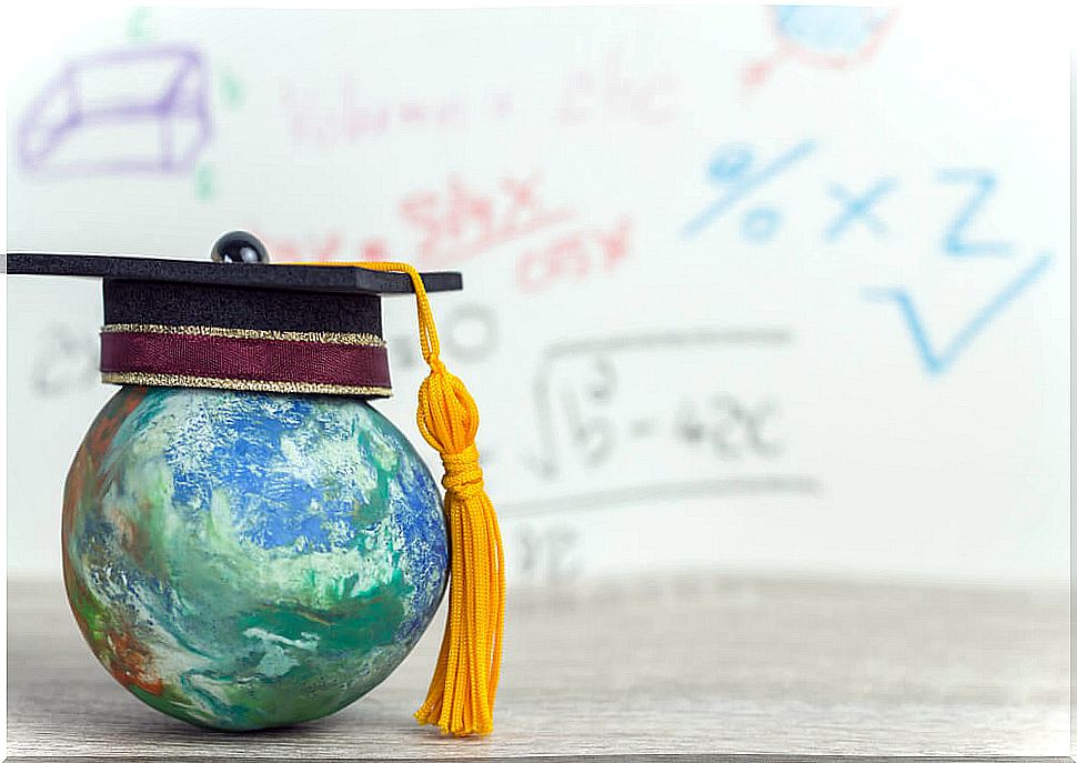 Globe of the world with a mortarboard to represent the competition of learning to learn, one of the pillars of education.