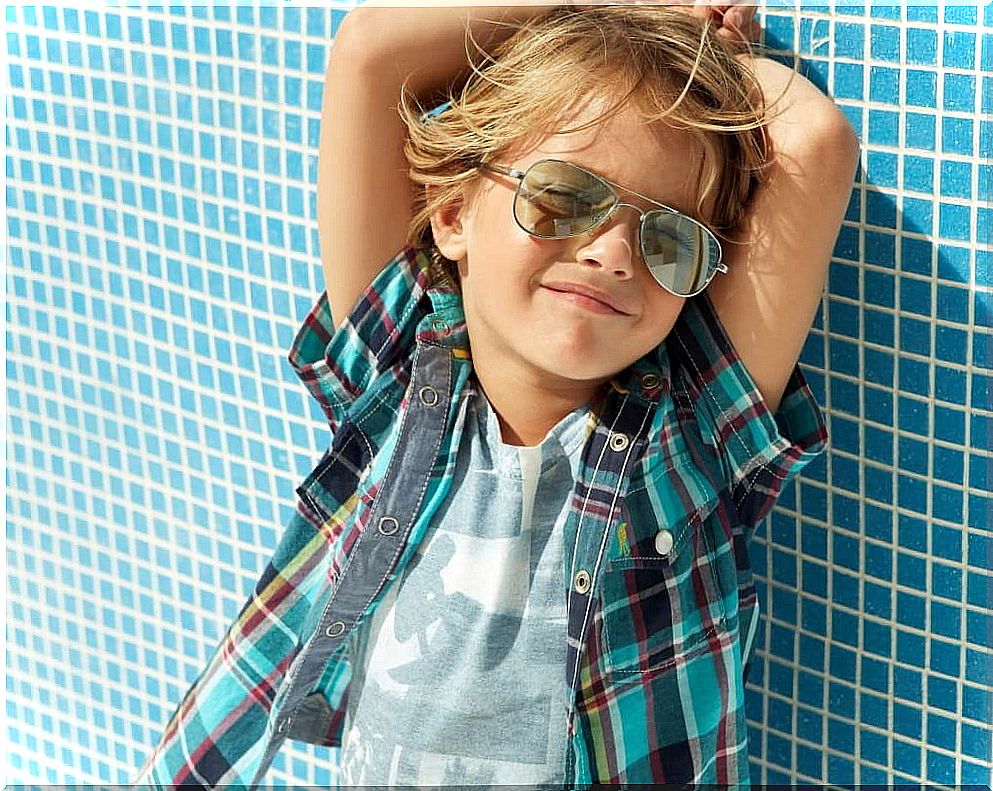 Boy with the surfer haircut.