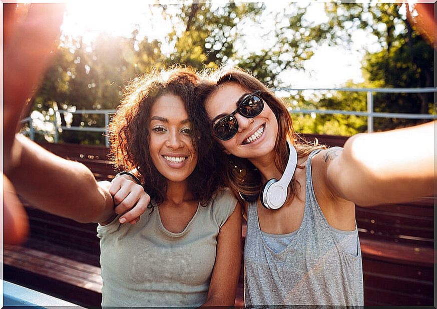 Selfie of two teenagers.