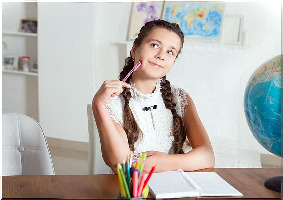 Girl thinking about her studies in Secondary Education.