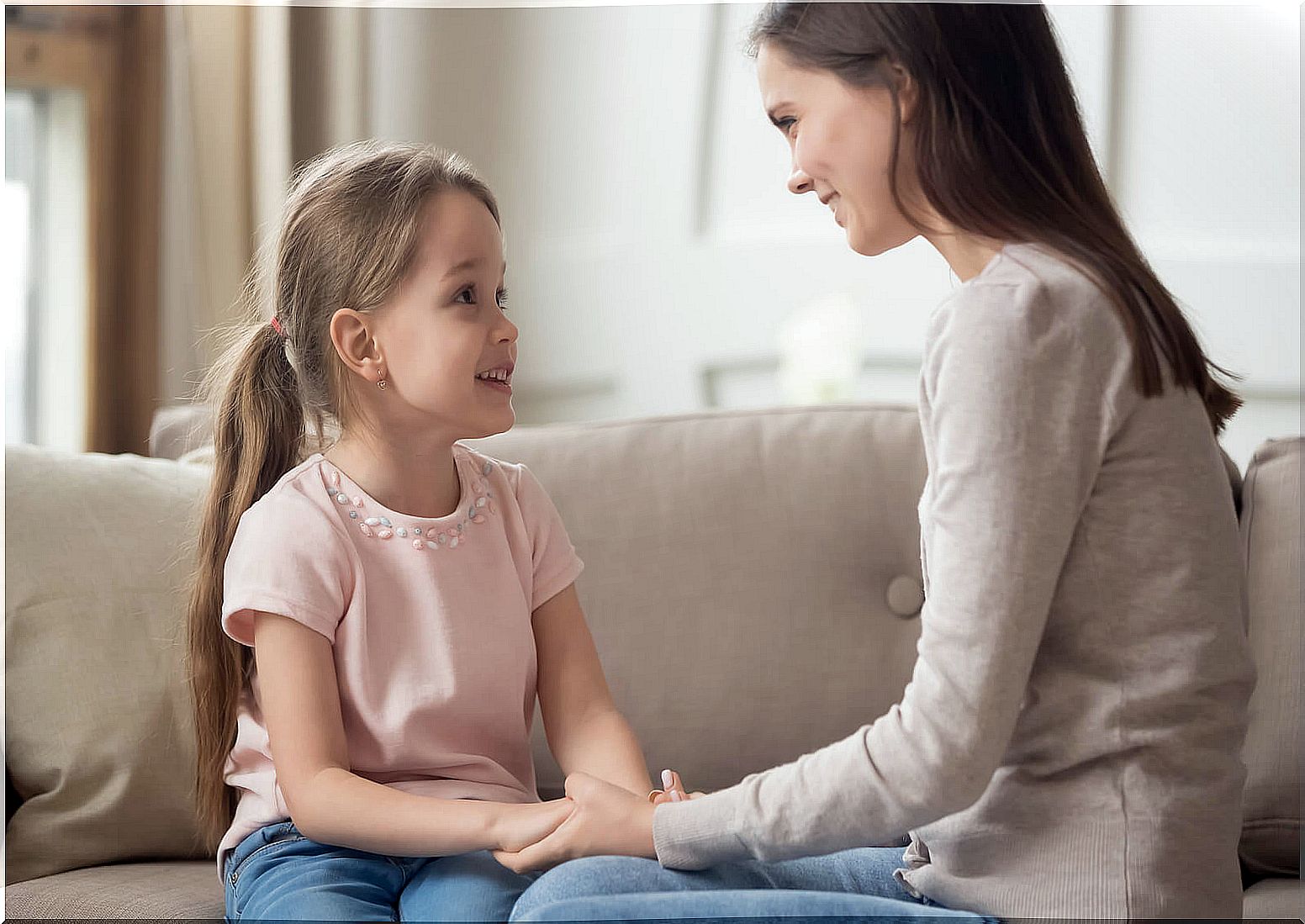 Mother using the three wake-up call technique with her daughter.