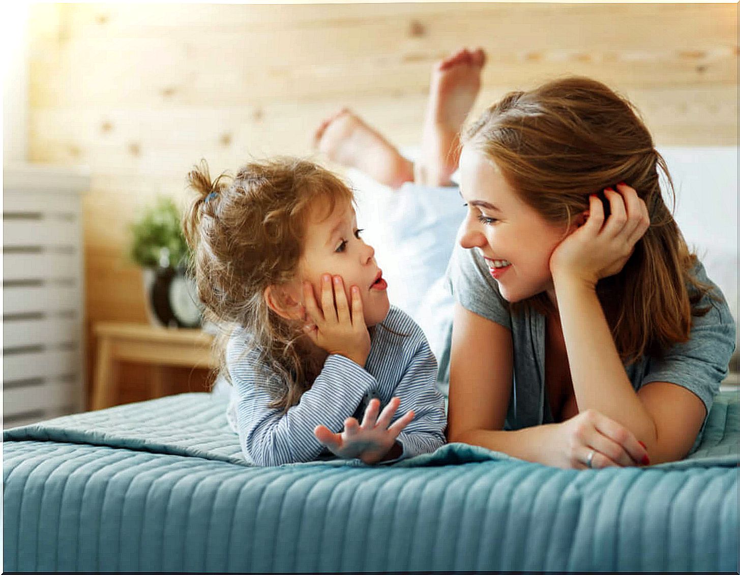 Mother helping her daughter to develop her critical sense.