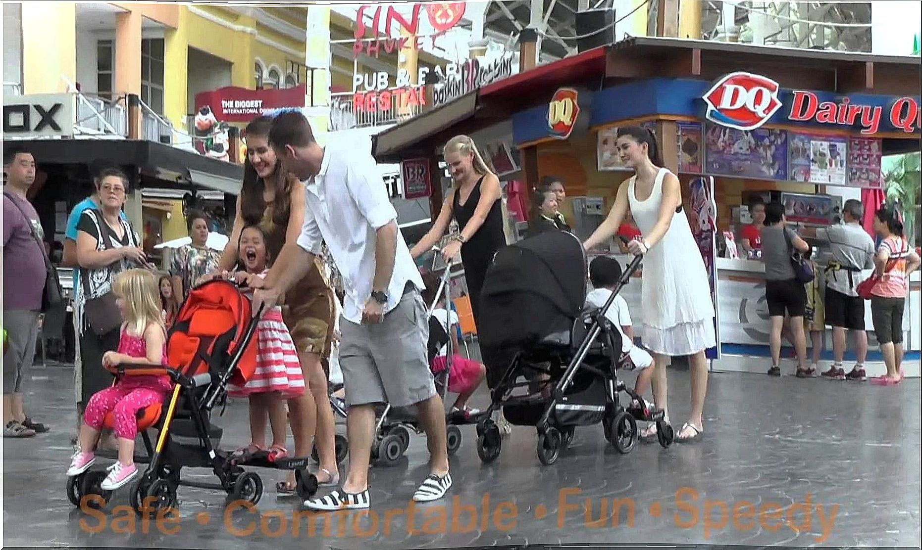 family in baby carriages